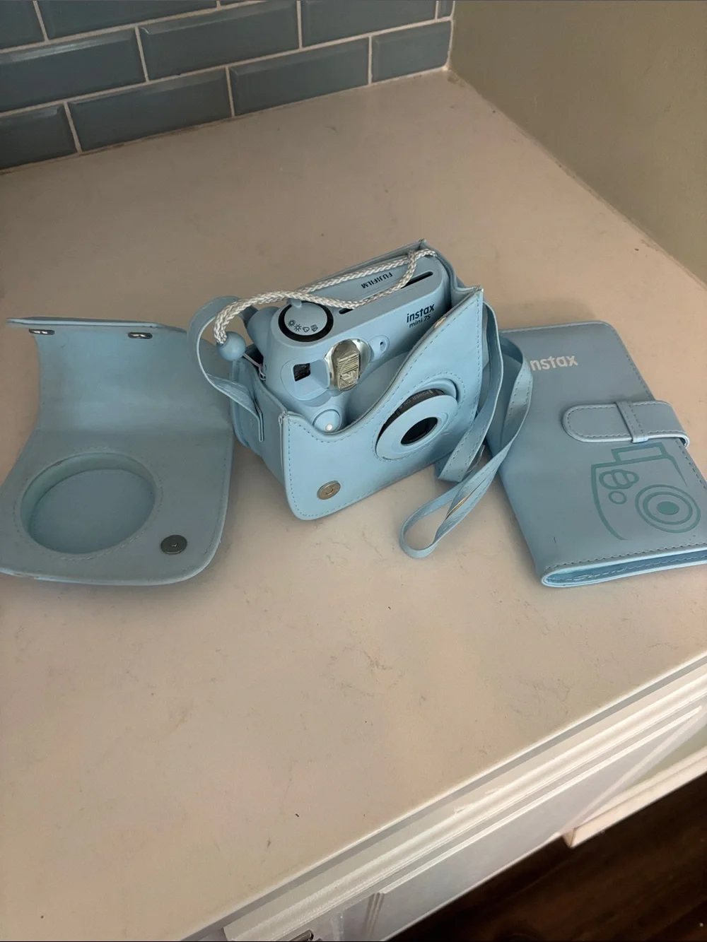 Fujifilm Instax Mini Camera with Light Blue Case and Album